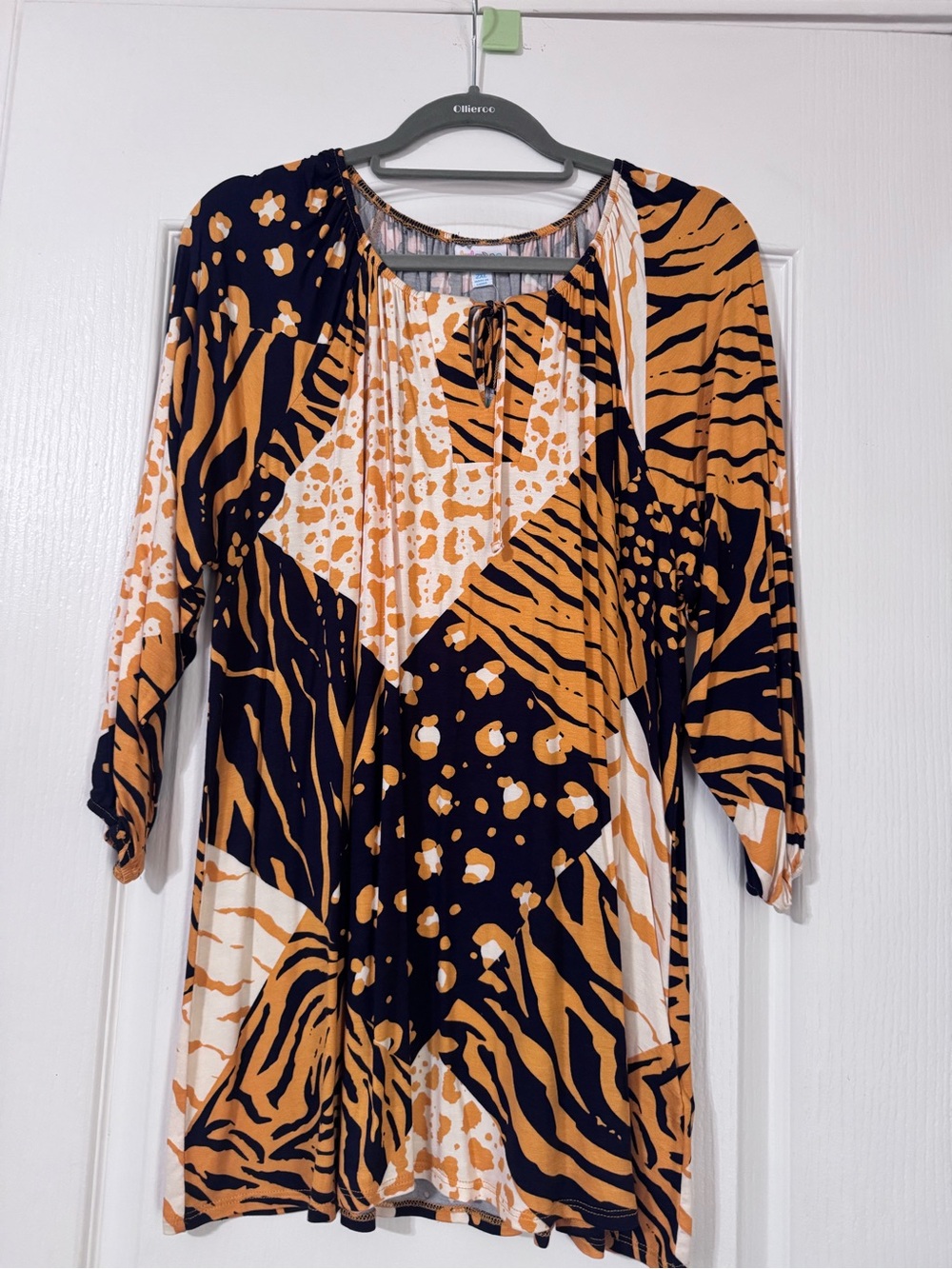 LuLaRoe  Debra Women's Tunic in Navy, Orange & White Animal Print